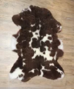 Dekorations und Sitz Fell einzigartig gescheckt (organisch)