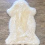 Dekorations und Sitz Fell Merino flauschig golden