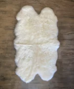 Dekorationsfell Merino 4-fach weiss, schwarz und platin – Bild 2