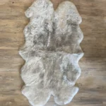 Dekorationsfell Merino 4-fach weiss, schwarz und platin