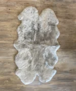 Dekorationsfell Merino 4-fach weiss, schwarz und platin