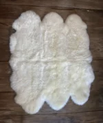 Dekorationfell Merino 6-fach schlicht in naturweiss