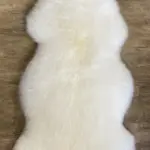 Dekorations und Sitz Fell Merino schlicht naturweiss