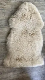 Dekorations und Sitz Fell Merino klassisch bernstein